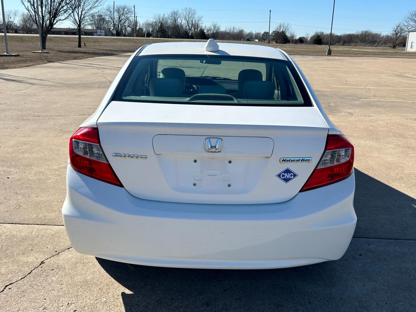 2012 White /Gray Honda Civic CNG Sedan 5-Speed AT (19XFB5F53CE) with an 1.8L L4 SOHC 16V CNG engine, 5-Speed Automatic transmission, located at 17760 Hwy 62, Morris, OK, 74445, (918) 733-4887, 35.609104, -95.877060 - 2012 HONDA CIVIC 1.8L FWD DEDICATED CNG (COMPRESSED NATURAL GAS) VEHICLE. FEATURES REMOTE KEYLESS ENTRY, POWER LOCKS, POWER WINDOWS, POWER MIRRORS, MANUEL SEATS, AM/FM RADIO, CD PLAYER, USB, AUX, BLUETOOTH FOR HANDS-FREE CALLING, 12V POWER OUTLET, CRUISE CONTROL, TRACTION CONTROL, AND CLOTH SEATS. 1 - Photo#5